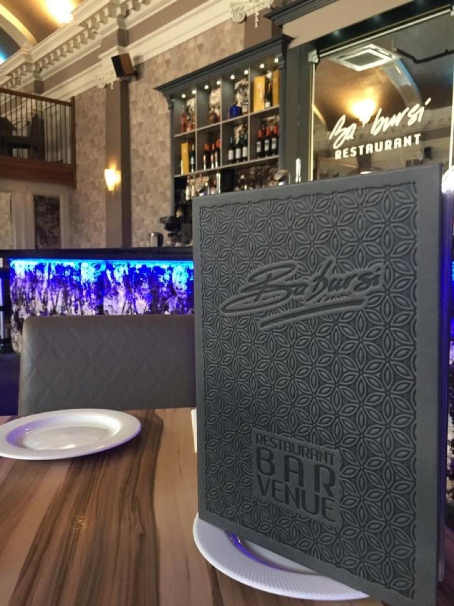 The Ba'Bursi menu book at the bar